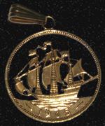 Circular pendant, hand-cut from a 1965 halfpenny